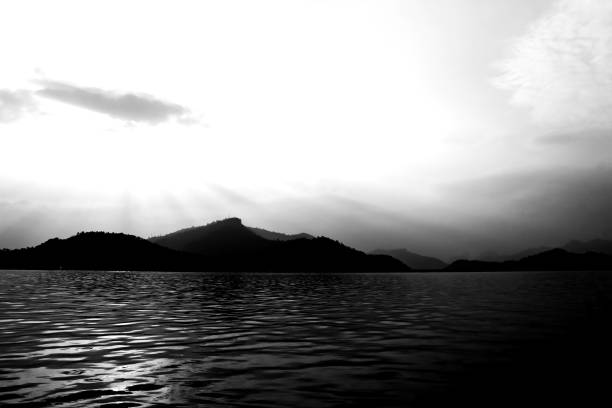 istock Beautiful mountain peak and river nature on black and white color shape for background. 875286884