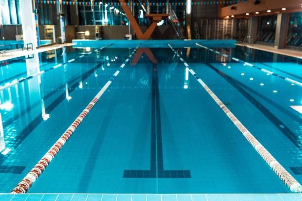istock lanes of a competition swimming pool 875290508