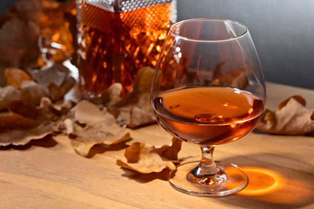 Brandy and dried up oak leaves .