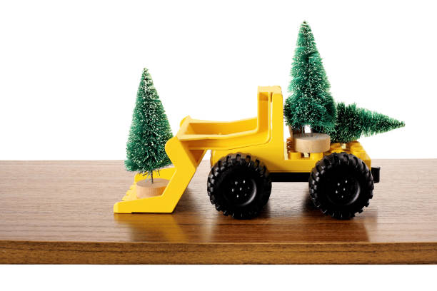 istock Toy Truck with Miniature Christmas Trees 875296508