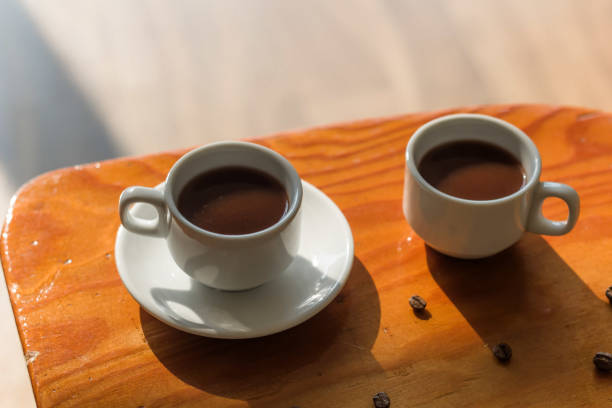 istock morning coffe. cups with black hot coffee 875296692