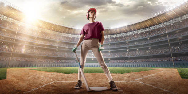 istock Softball female player on a professional arena 875297090