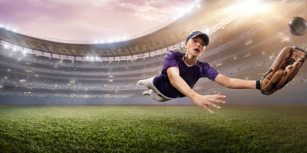 istock Softball female player on a professional arena 875297092