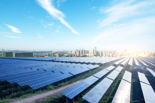 istock solar panel with cityscape of los angeles in cloud sky 875297860