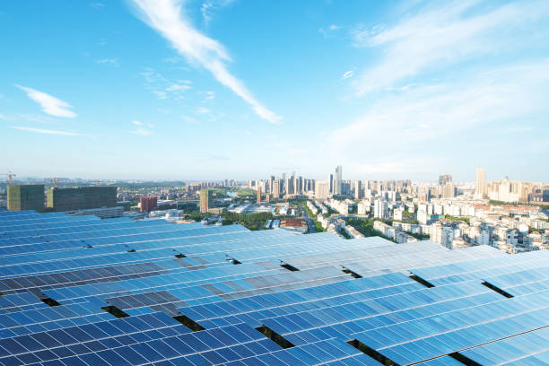 istock solar panel with cityscape of los angeles in cloud sky 875300120