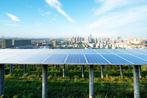 istock solar panel with cityscape of los angeles in cloud sky 875300140