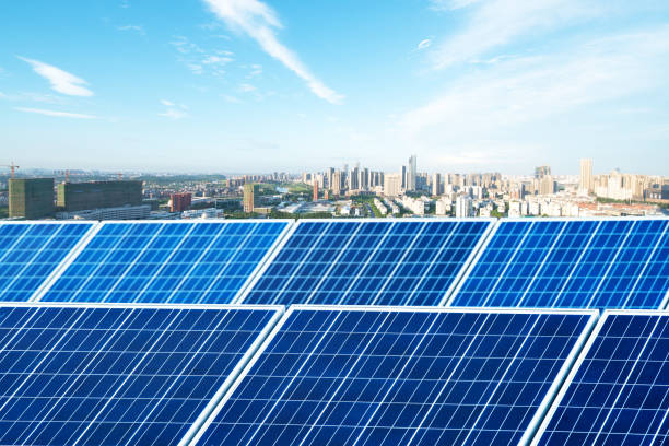 istock solar panel with cityscape of los angeles in cloud sky 875300448
