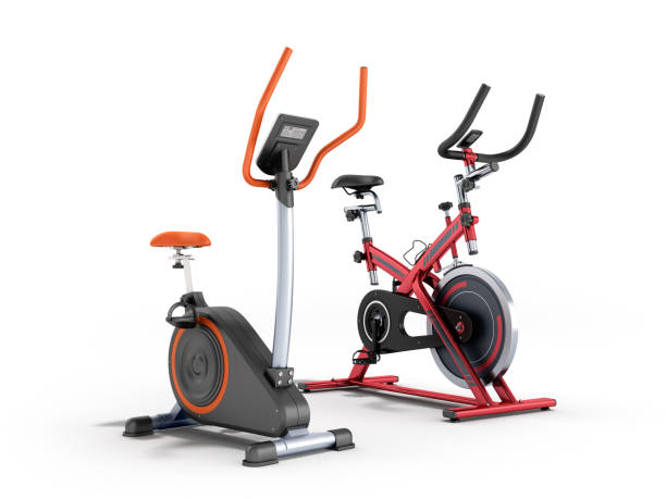 istock Two modern sport exercise bike yellow purple 3d render on white background 875307898