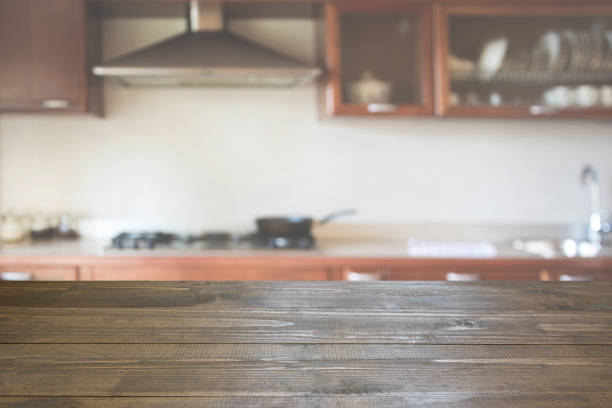 istock Blurred background. Modern kitchen with tabletop and space for you. 875316046