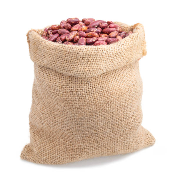 red kidney bean cranberry in burlap sack bag isolated on white background - sack bag bean burlap imagens e fotografias de stock