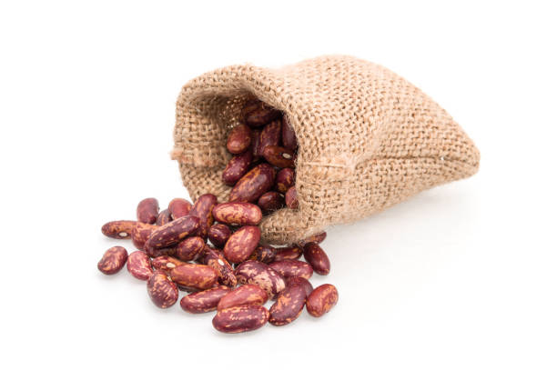 red kidney bean cranberry in burlap sack bag isolated on white background - sack bag bean burlap imagens e fotografias de stock