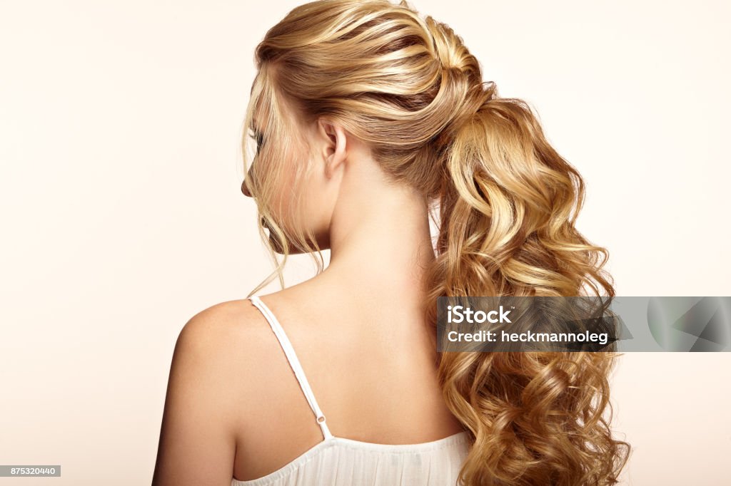 Blonde Girl With Long And Shiny Curly Hair Stock Photo - Download Image Now  - Ponytail, Women, Hairstyle - iStock