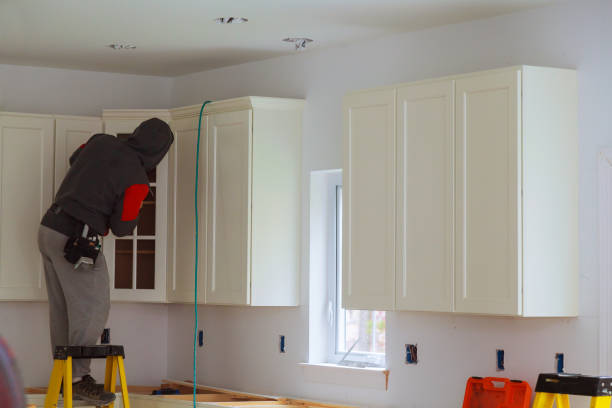 istock Craftsman kitchen carpenter at kitchen furniture installation service work 875326994