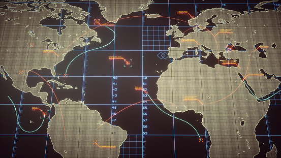 An abstract digital world map containing communication lines and digital infographics. Various objects on the map are being tracked and analyzed.

