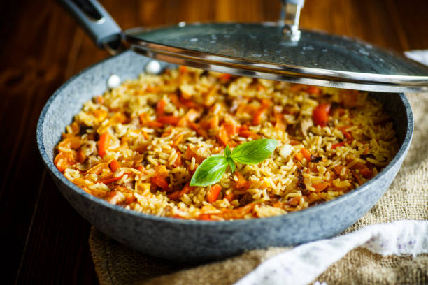 istock Pilaf with beef, carrots, onions, garlic, pepper and cumin. 875328770