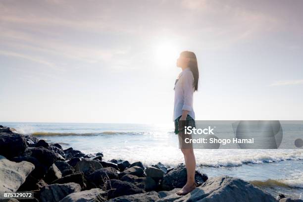 Schoolgirl On A Beach Stock Photo - Download Image Now - Female High School Student, Japanese School Uniform, Japan
