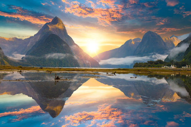The Milford Sound fiord. Fiordland national park, New Zealand Famous Mitre Peak rising from the Milford Sound fiord. Fiordland national park, New Zealand glacier photos stock pictures, royalty-free photos & images