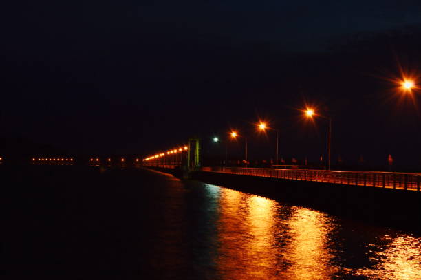 istock big concrete dam in Thailand on night 875332562