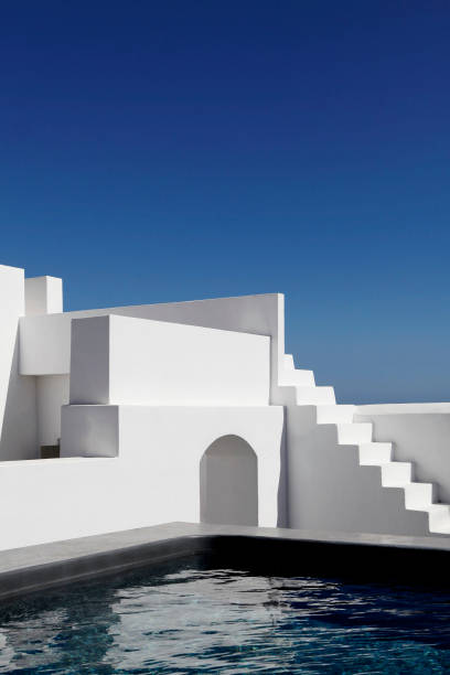 istock Santorini white stairs and a pool 875335054