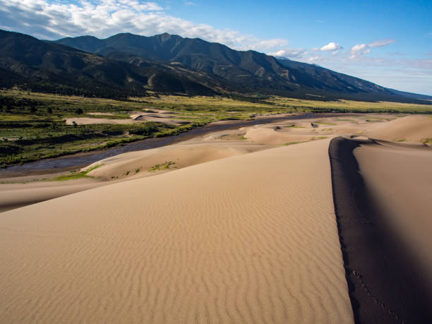 istock Great Sand Dunes Landscape, Dunes, River, Mountain Range, Colorado 875340010