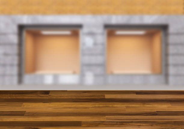 istock The wooden table. Blurred interior. Empty shop window 875346446