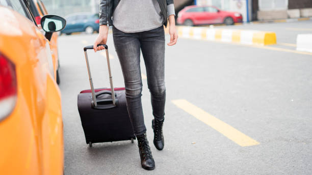 istock Passenger walking  at the airport with suitcase 875346572