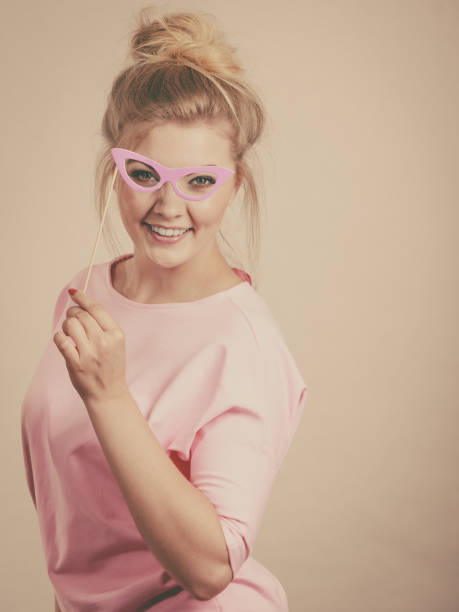 istock Elegant woman pretending wearing eyeglasses 875359864