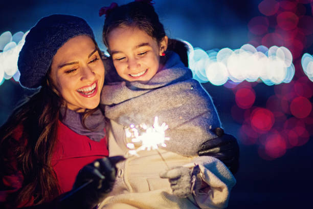 istock Mother is hugging her daughter at Christmas 875363730