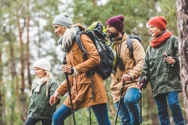 istock family walking in autumn forest 875363856