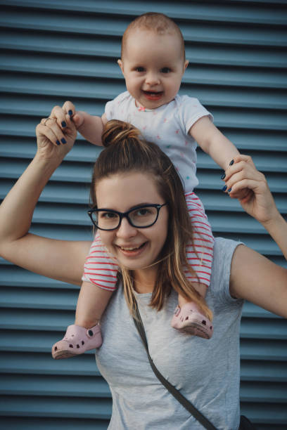 istock Young mother with baby girl 875364132
