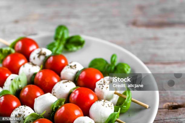 Caprese Salad Skewer With Tomato Mozzarella And Basil Italian Food And Healthy Vegetarian Diet Concept Stock Photo - Download Image Now