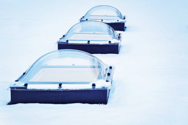 skylight glass domes on roof of building in snow helsinki - cupola imagens e fotografias de stock