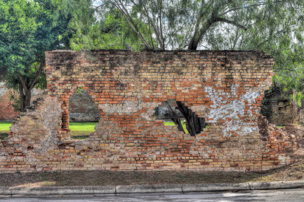 An old brick wall is all that is left of this building in Texas near the Mexican Border