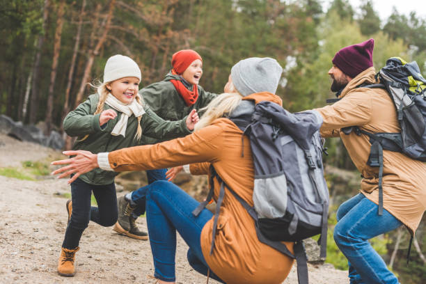 istock happy family in forest 875369826