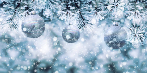 istock Christmas blue banner with balls hanging 875375992