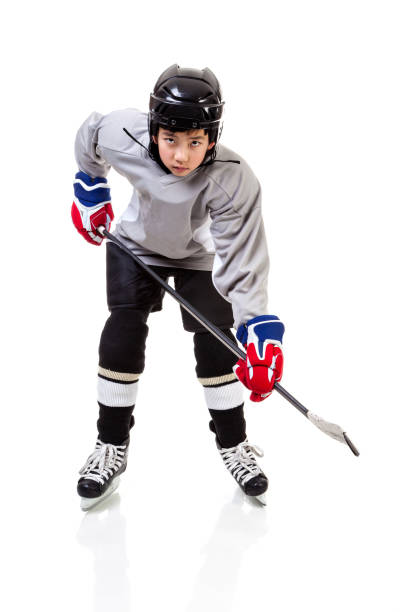 istock Junior Ice Hockey Player Isolated on White Background 875384146