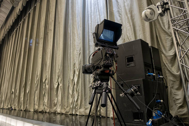 istock tv camera in a concert hall. 875388082