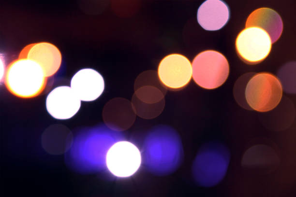 Lights blurred bokeh background from christmas night party for your design, vintage or retro color toned. Lights blurred bokeh background from christmas night party for your design, vintage or retro color toned. bicycle light photos stock pictures, royalty-free photos & images