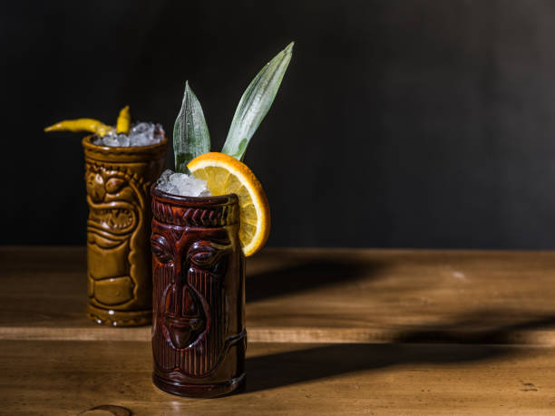 Exotic tropical tiki cocktails on a black background