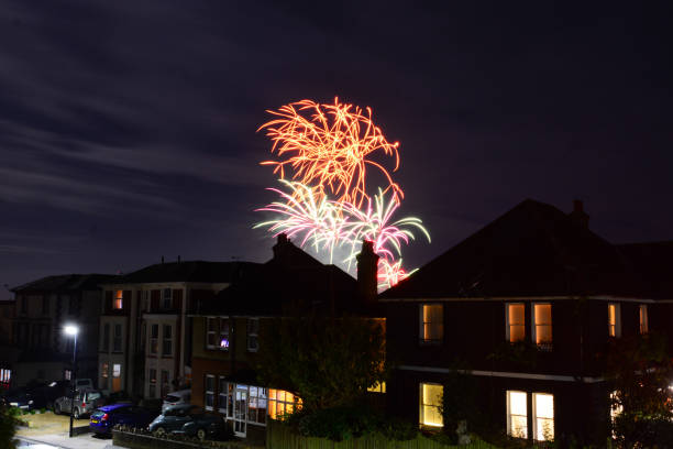 Fireworks Over Rooftops stock photo