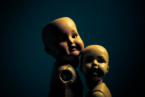 istock Pair of creepy dolls 875408898