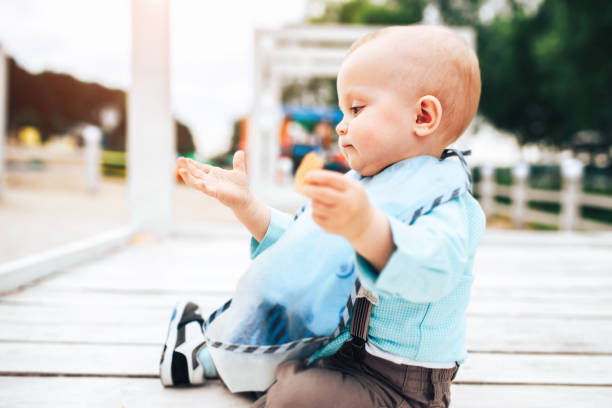 istock Cute little boy playing outdoor 875419464