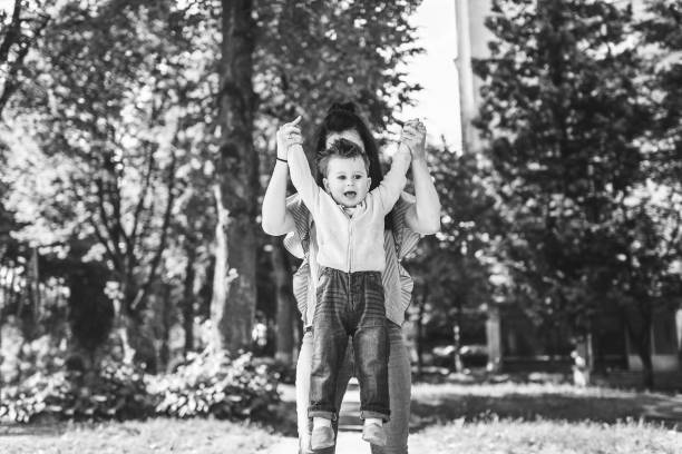 istock Mother with little son outdoor 875419788