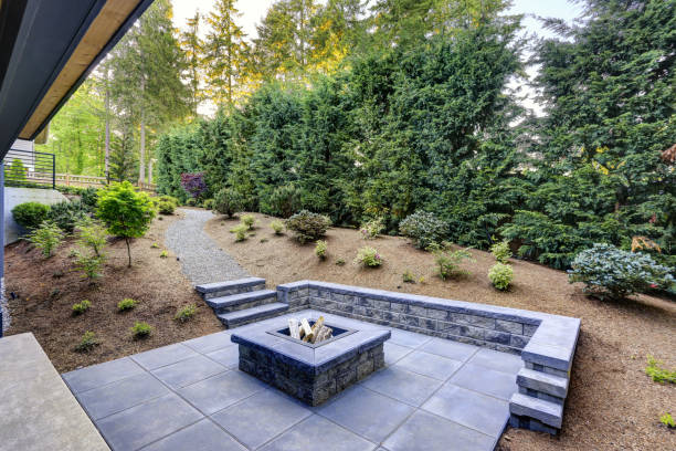 New modern home features a backyard with fire pit stock photo