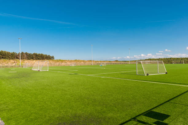 istock artificial turf football field 875423638