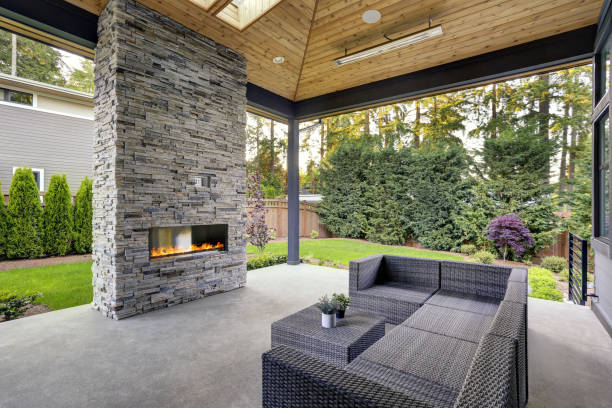 New modern home features a backyard with patio stock photo