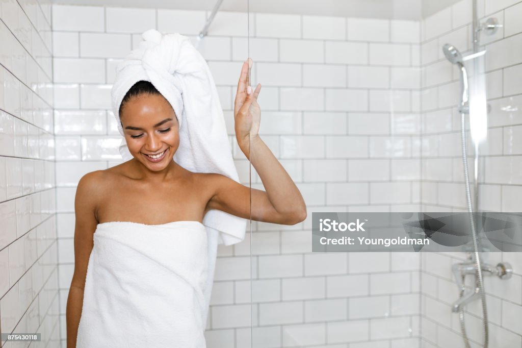 Young Woman In White Towels Wrapped Around Head And Body After Shower Stock  Photo - Download Image Now - iStock
