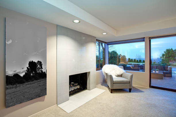 istock Lovely bedroom design with fireplace and exit to patio 875433866