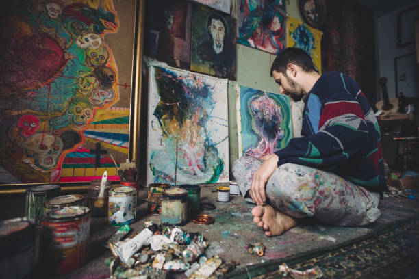 istock Man enjoying in painting 875434242