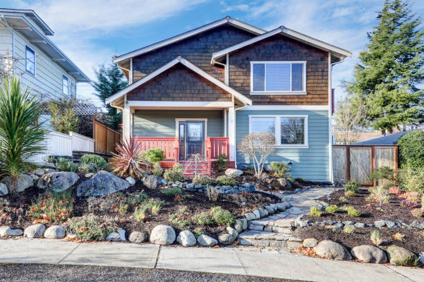 istock Nice Craftsman home exterior on blue sky background 875434388